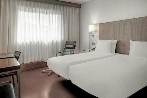 Habitación Doble Estándar - 2 camas del hotel Ac Porto By Marriott. Foto 1