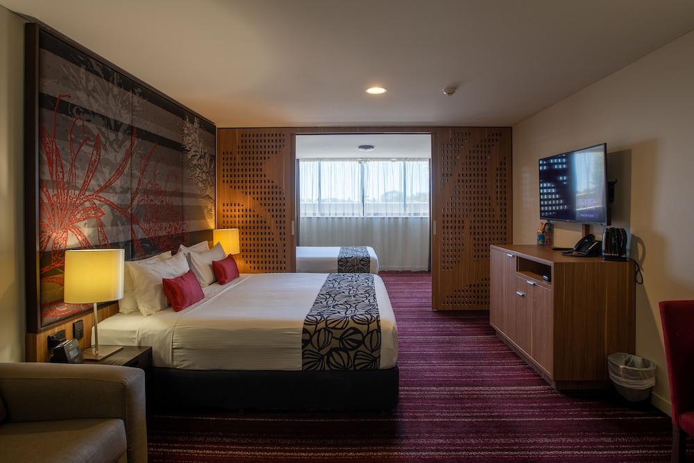 Suite Familiar con 1 cama King y 1 cama Queen del hotel Mantra Gladstone. Foto 7