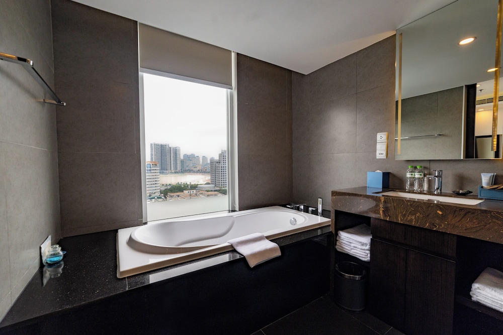 APARTAMENTO EJECUTIVO DE 1 DORMITORIO Cama King del hotel Novotel Suites Hanoi. Foto 6