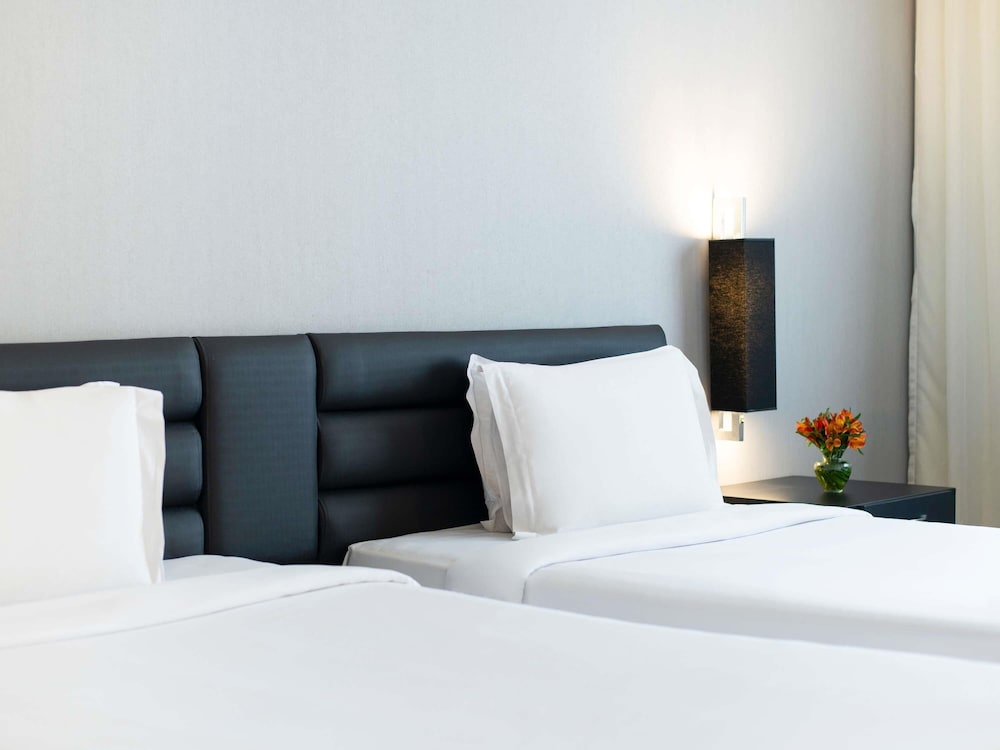 Habitación Superior con camas individuales del hotel Grand Mercure São Paulo Vila Olímpia. Foto 2