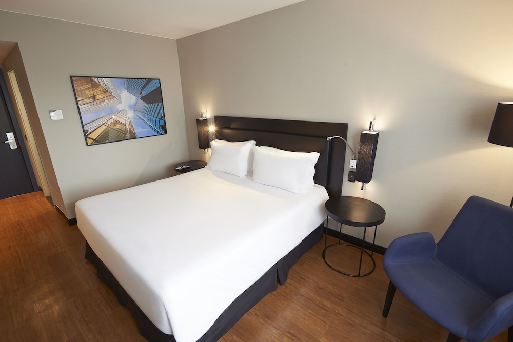 Habitación ejecutiva con 1 cama queen - size del hotel Grand Mercure São Paulo Vila Olímpia. Foto 1
