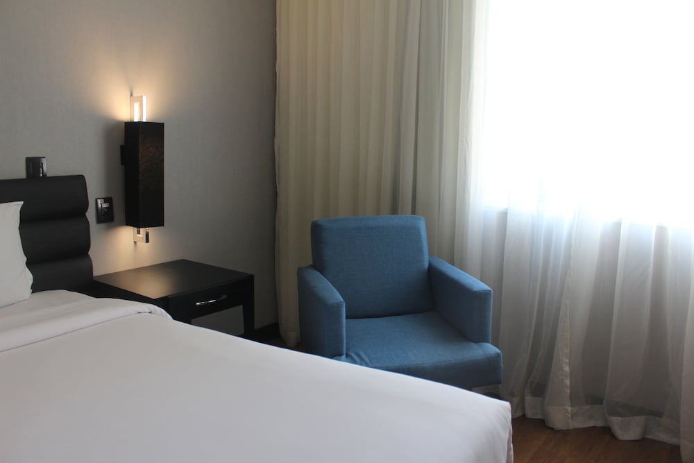 Habitación ejecutiva con 1 cama queen - size del hotel Grand Mercure São Paulo Vila Olímpia. Foto 9