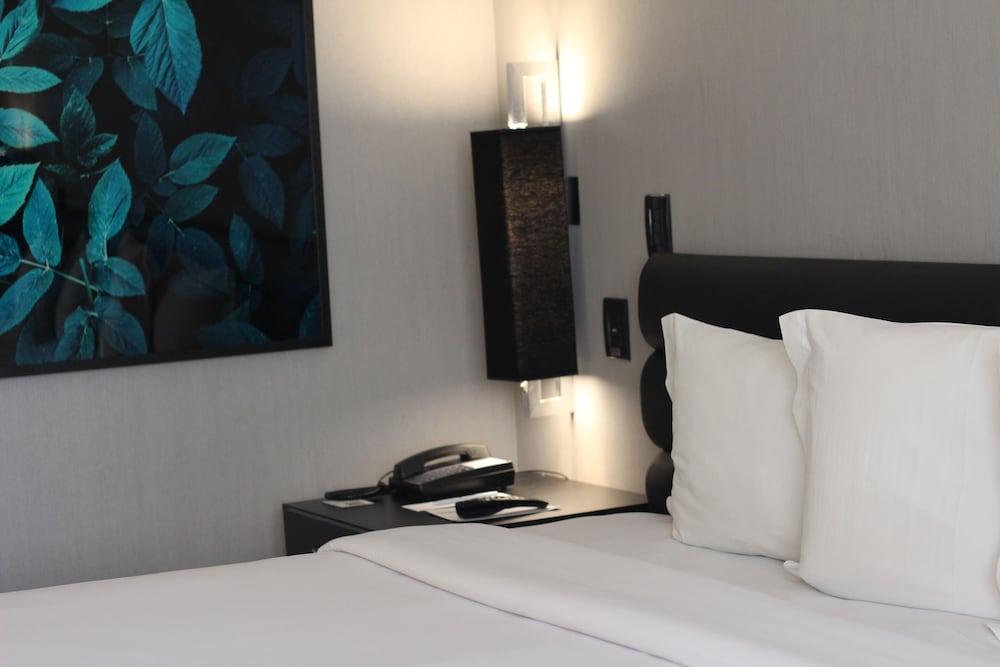 Habitación ejecutiva con 1 cama queen - size del hotel Grand Mercure São Paulo Vila Olímpia. Foto 10