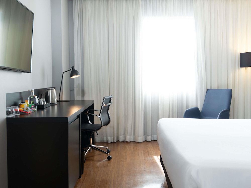 Habitación ejecutiva con 1 cama queen - size del hotel Grand Mercure São Paulo Vila Olímpia. Foto 17