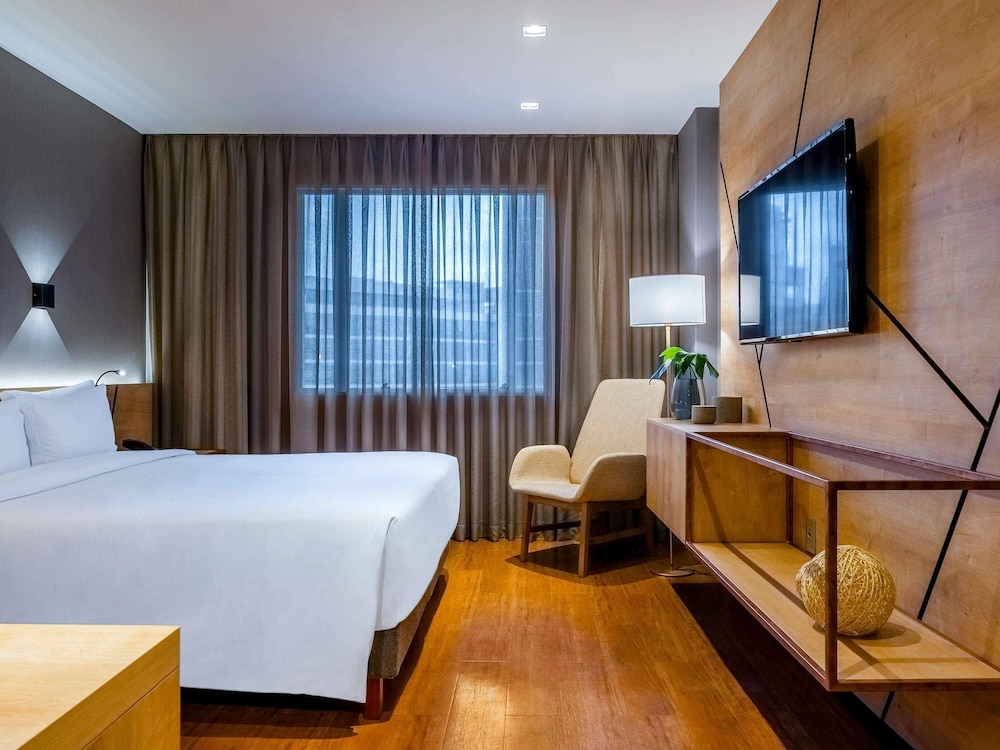 HABITACIÓN EJECUTIVA PREMIUM, 1 cama queen - size del hotel Grand Mercure São Paulo Vila Olímpia. Foto 19