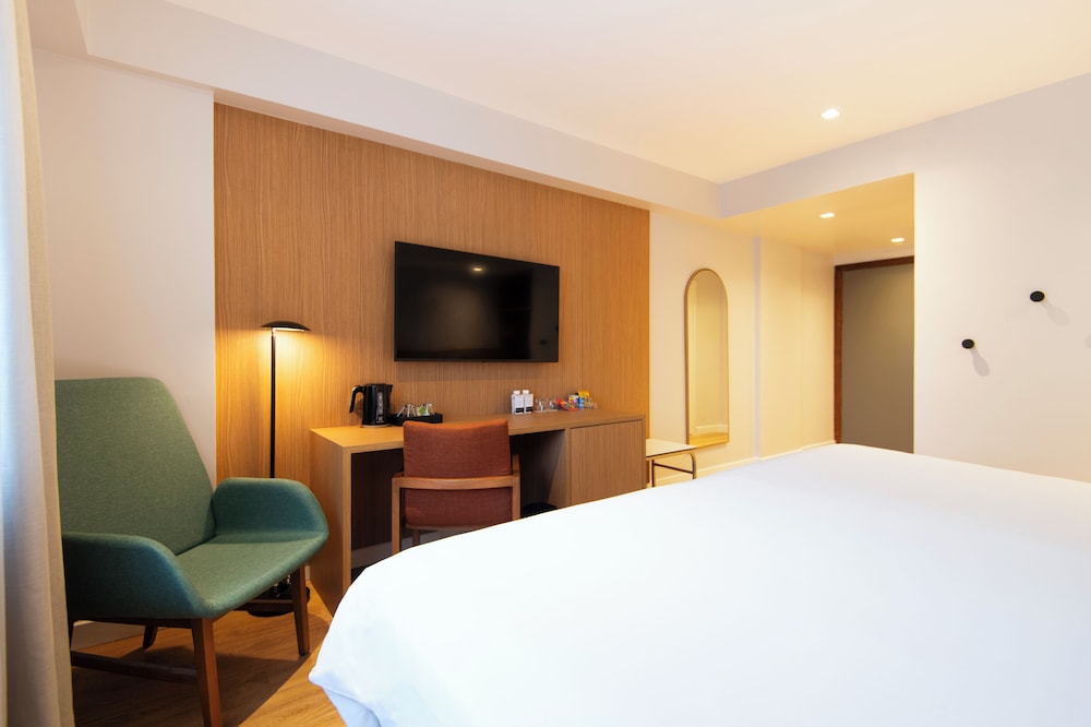HABITACIÓN DELUXE con 1 cama doble king - size del hotel Grand Mercure São Paulo Vila Olímpia. Foto 8