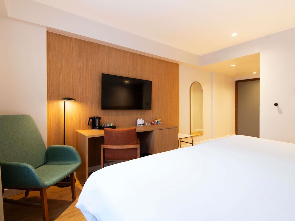 HABITACIÓN DELUXE con 1 cama doble king - size del hotel Grand Mercure São Paulo Vila Olímpia. Foto 15