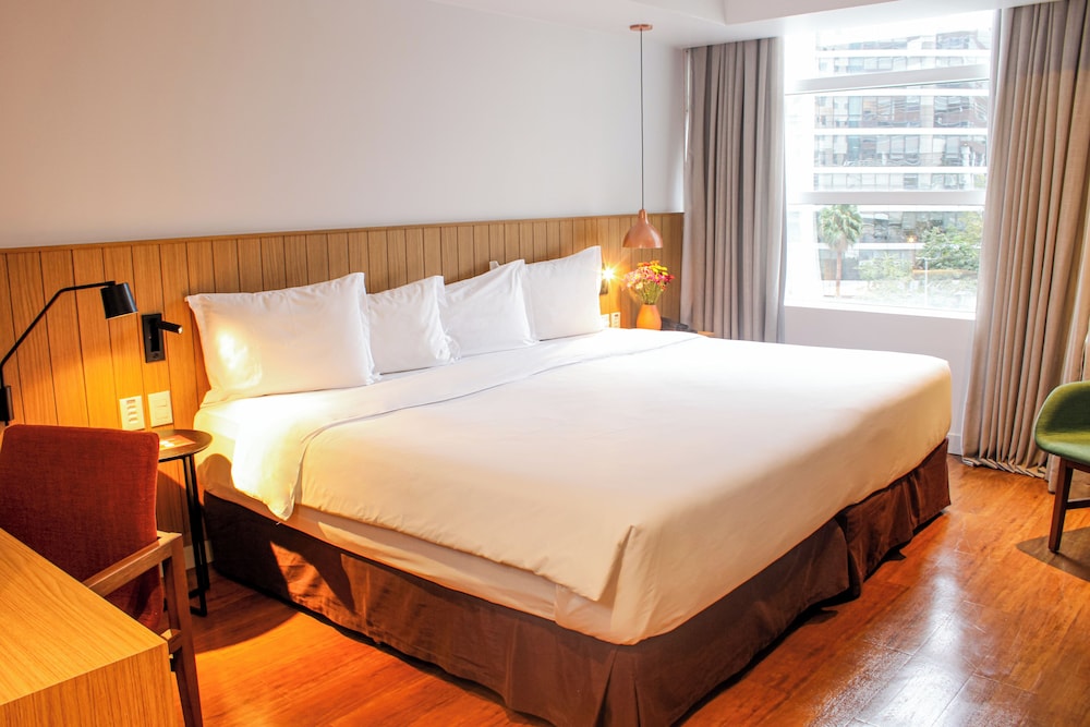 HABITACIÓN DELUXE con 1 cama doble king - size del hotel Grand Mercure São Paulo Vila Olímpia. Foto 19