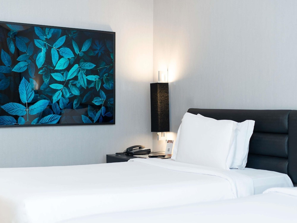 Habitación Superior con camas individuales del hotel Grand Mercure São Paulo Vila Olímpia. Foto 8