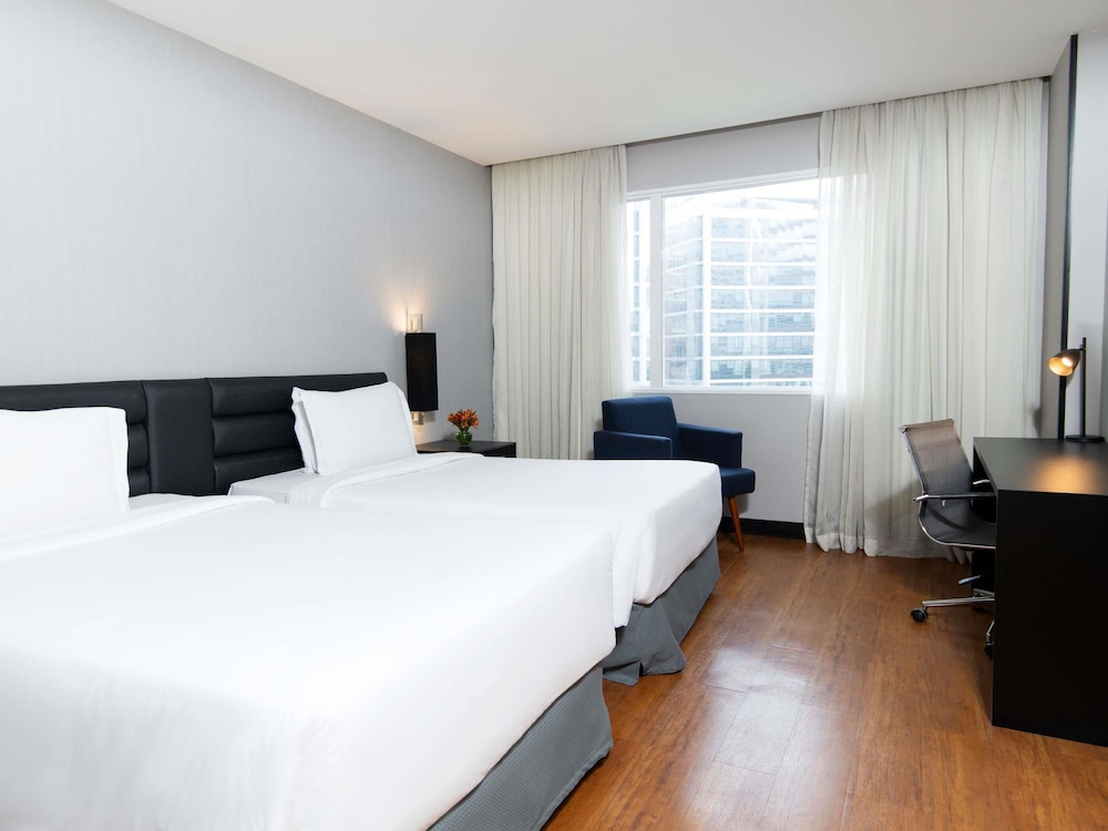 Habitación Superior con camas individuales del hotel Grand Mercure São Paulo Vila Olímpia. Foto 10