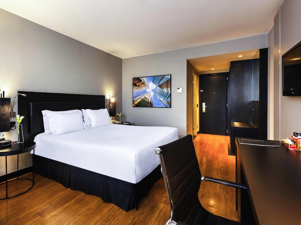 Habitación ejecutiva con 1 cama queen - size del hotel Grand Mercure São Paulo Vila Olímpia. Foto 16