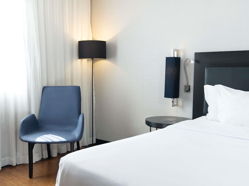 Habitación ejecutiva con 1 cama queen - size del hotel Grand Mercure São Paulo Vila Olímpia. Foto 25
