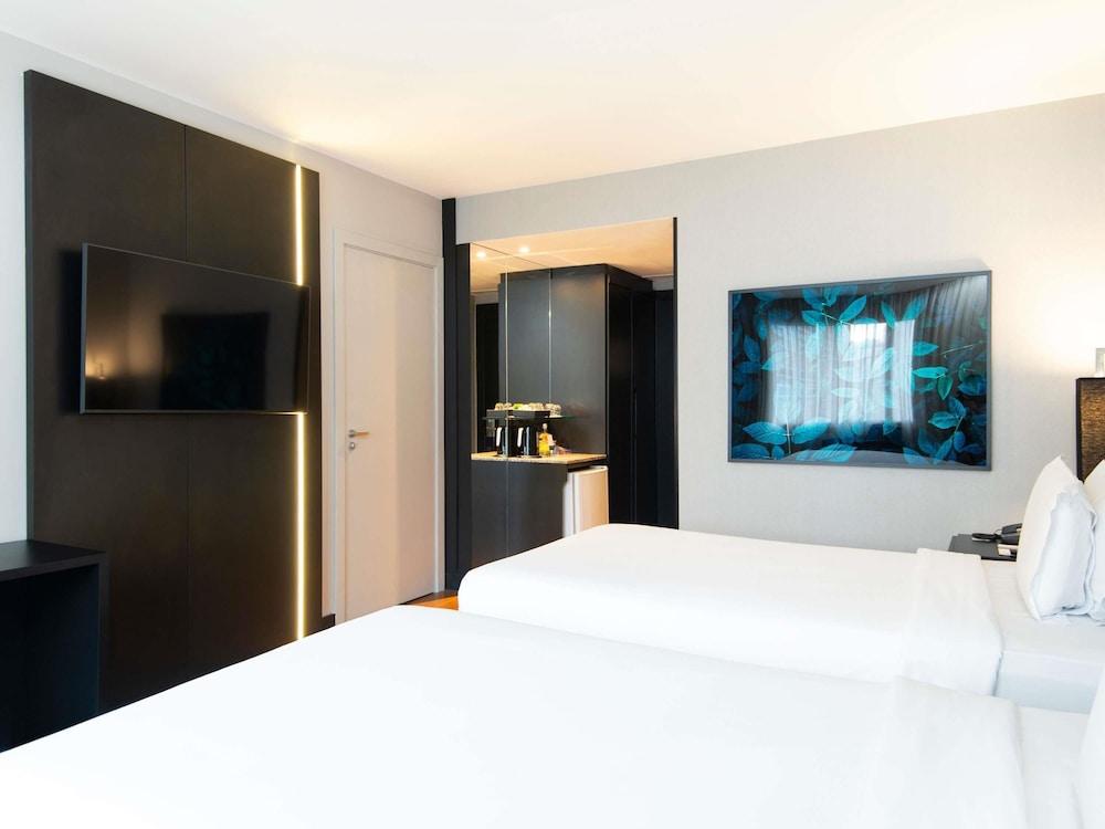 Habitación Superior con camas individuales del hotel Grand Mercure São Paulo Vila Olímpia. Foto 9