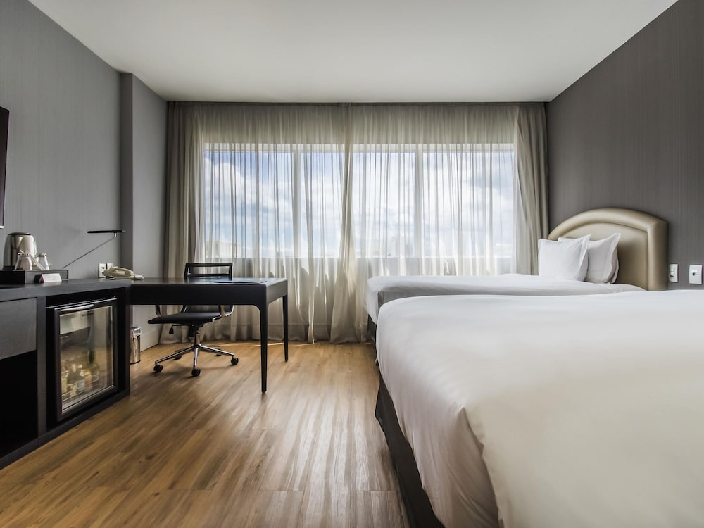 Habitación Deluxe con 2 camas individuales, 2 camas individuales, bañera del hotel Pullman São Paulo Vila Olímpia