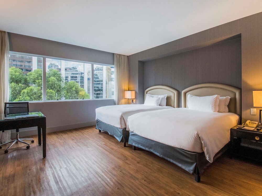 Habitación Deluxe con 2 camas individuales, 2 camas individuales, bañera del hotel Pullman São Paulo Vila Olímpia. Foto 10