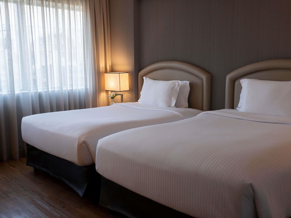 Habitación Deluxe con 2 camas individuales, 2 camas individuales, bañera del hotel Pullman São Paulo Vila Olímpia. Foto 12
