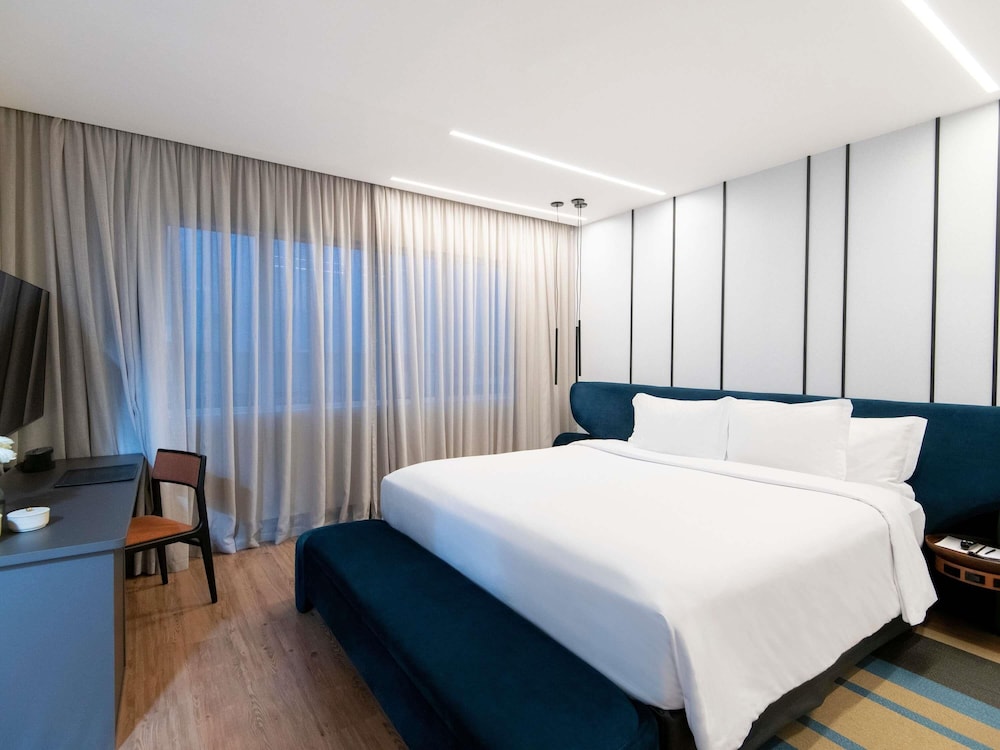 Suite familiar, 1 cama de matrimonio grande, bañera del hotel Pullman São Paulo Vila Olímpia. Foto 15