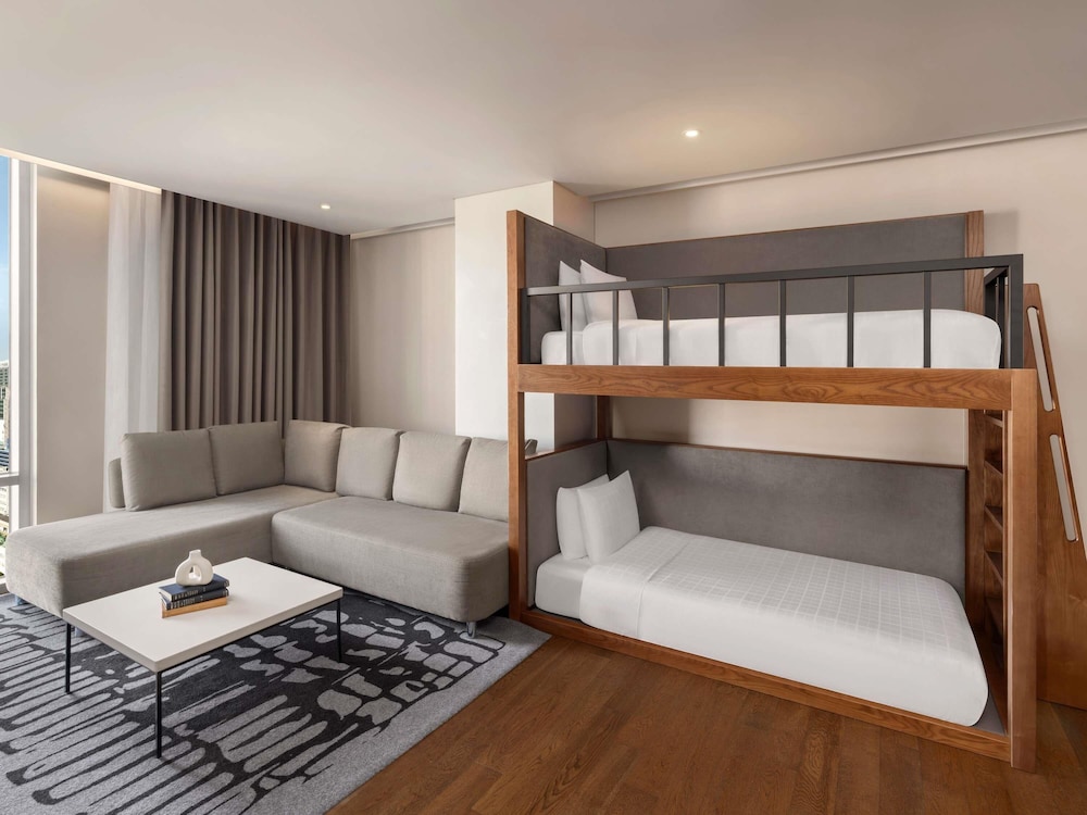 Residencia Premier Familiar 1 Dormitorio - 1 cama doble y 1 cama litera del hotel Novotel Ambassador Seoul Dongdaemun Hotels and Residences. Foto 1