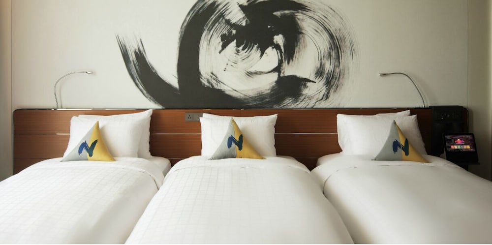 Habitación Superior - 3 camas individuales del hotel Novotel Ambassador Seoul Dongdaemun Hotels and Residences. Foto 4