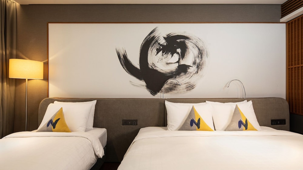Habitación Superior - 1 cama doble y 1 cama individual del hotel Novotel Ambassador Seoul Dongdaemun Hotels and Residences. Foto 1