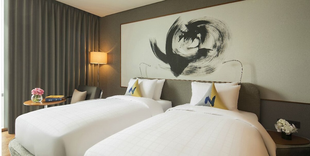 Habitación Ejecutiva - 2 camas individuales del hotel Novotel Ambassador Seoul Dongdaemun Hotels and Residences. Foto 6