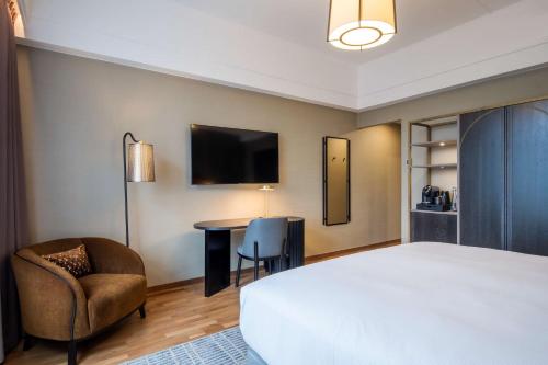 Habitación Doble Deluxe con vistas - 1 cama grande del hotel Doubletree By Hilton Brussels City. Foto 1