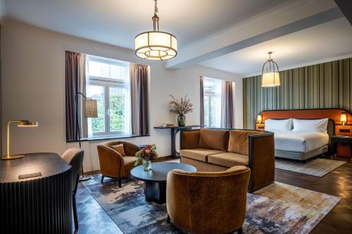 Suite Junior con cama extragrande y vistas del hotel Doubletree By Hilton Brussels City. Foto 1