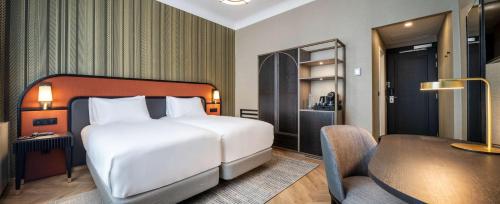 Habitación Familiar Comunicada - 2 camas del hotel Doubletree By Hilton Brussels City. Foto 3