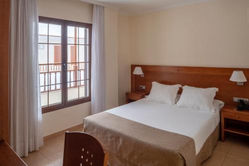 Habitación Doble interior - 1 o 2 camas del hotel Checkin Diamar. Foto 1