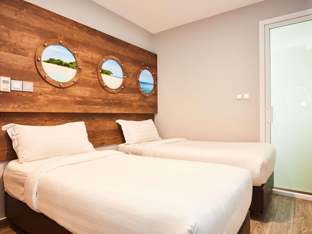 Cabaña con 2 camas individuales del hotel Ibis Budget Singapore Selegie. Foto 8
