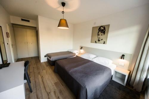 Habitación Triple Estándar del hotel Garden. Foto 5