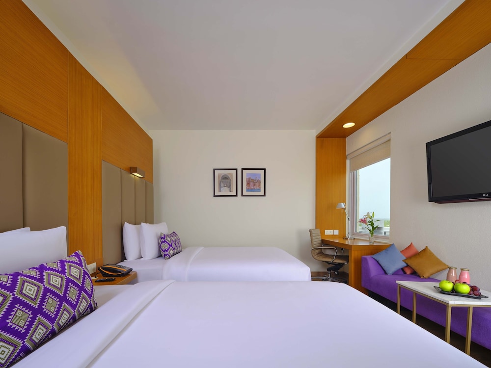 Habitación Deluxe, 1 cama individual del hotel Vivanta Ahmedabad Sg Highway. Foto 1
