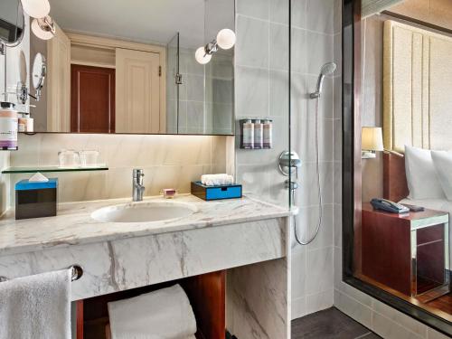 Classic Twin Room - Complimentary daily chocolate hour 5 - 6pm del hotel Mövenpick Hotel Hanoi Centre. Foto 3