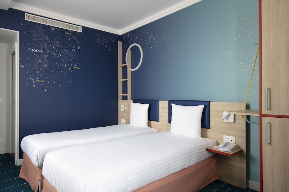 Habitación estándar doble del hotel Grand Magic Hotel Marne La Vallée. Foto 1