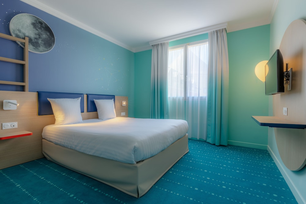 Habitación estándar doble del hotel Grand Magic Hotel Marne La Vallée. Foto 6