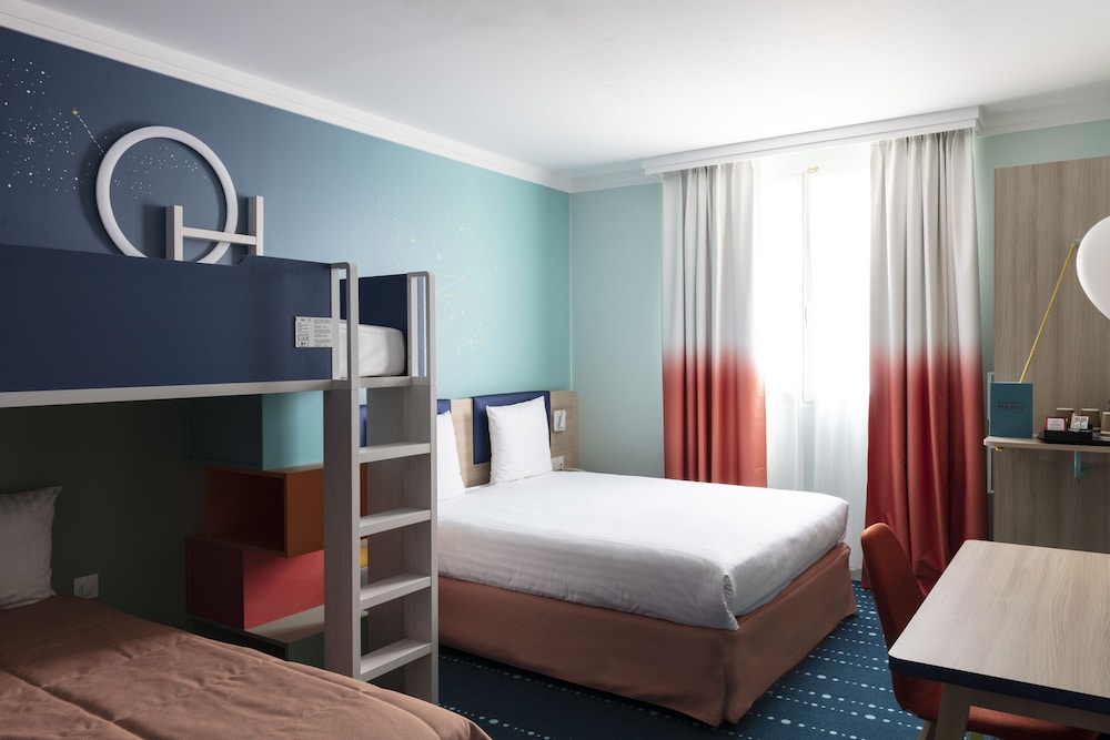Habitación Familiar del hotel Grand Magic Hotel Marne La Vallée. Foto 1