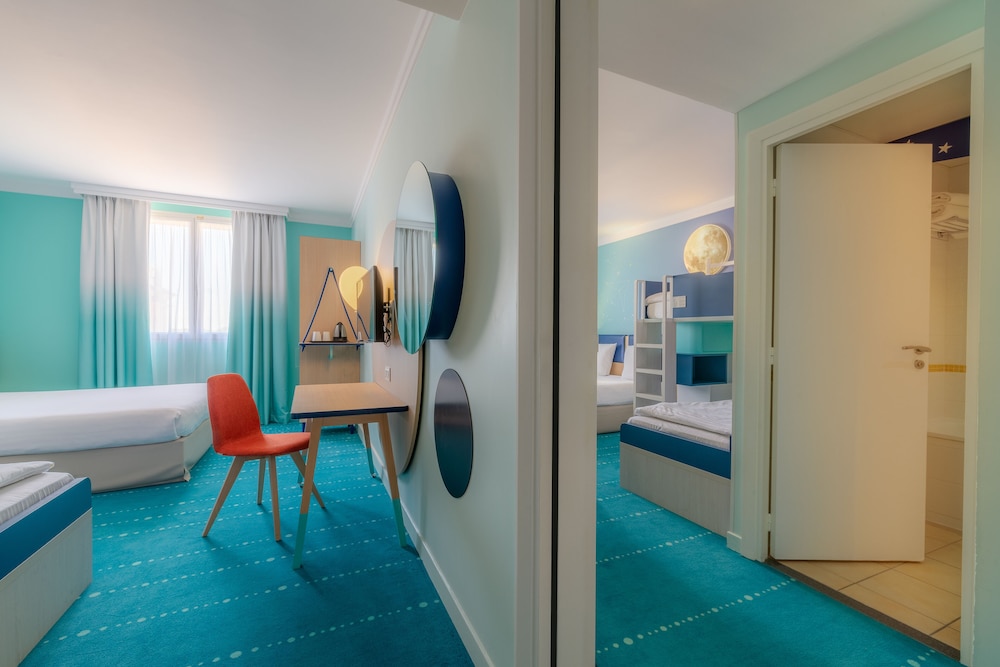 Habitación familiar, habitaciones comunicadas del hotel Grand Magic Hotel Marne La Vallée