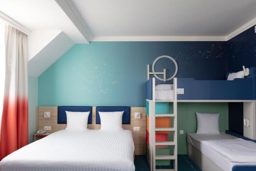 Family Suite (Up to 4) del hotel Grand Magic Hotel Marne La Vallée. Foto 5
