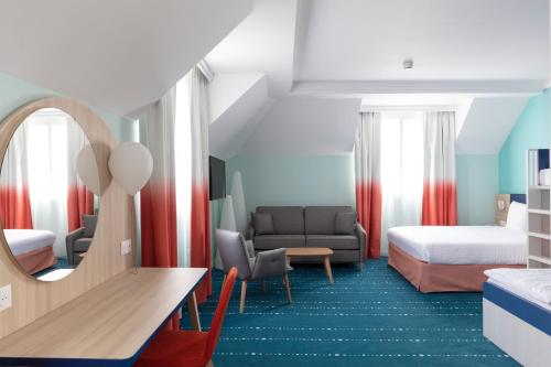 Family Suite (Up to 6) del hotel Grand Magic Hotel Marne La Vallée. Foto 2