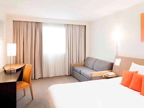 Habitación Superior Familiar - 1 cama doble y 1 sofá - cama del hotel Novotel Centre Nantes Bord De Loire. Foto 4