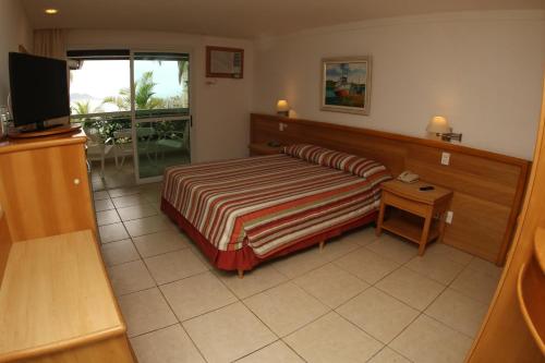 Habitación Doble Deluxe con vistas al mar del hotel Atlantico Buzios Convention and Resort. Foto 3