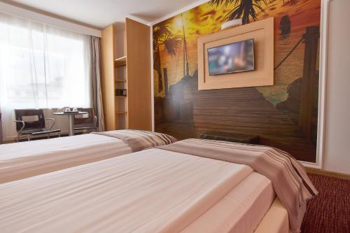 Habitación Doble Estándar - 2 camas del hotel Mycontinental Bucuresti Gara De Nord. Foto 3