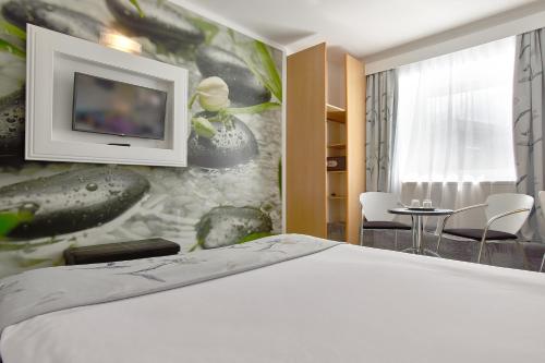 Habitación Doble Superior del hotel Mycontinental Bucuresti Gara De Nord. Foto 4