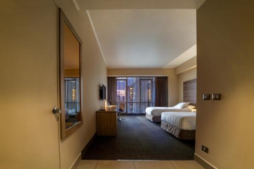 Habitación Doble Estándar - 2 camas del hotel Mercure Concepción. Foto 1