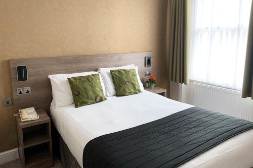 Habitación Doble con baño privado del hotel Kensington Gardens. Foto 1