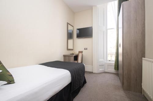 Habitación Individual con baño privado del hotel Kensington Gardens. Foto 1