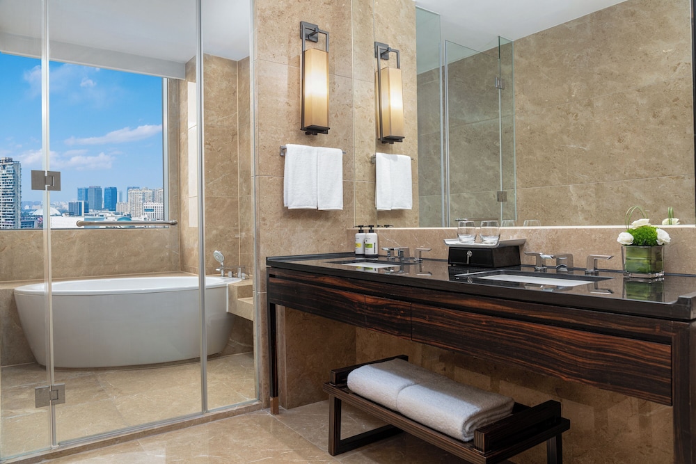 Suite Deluxe, 1 cama de matrimonio grande del hotel Pullman Haining. Foto 3