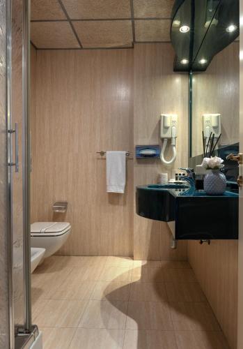 Habitación Doble con Cama supletoria del hotel Galilei