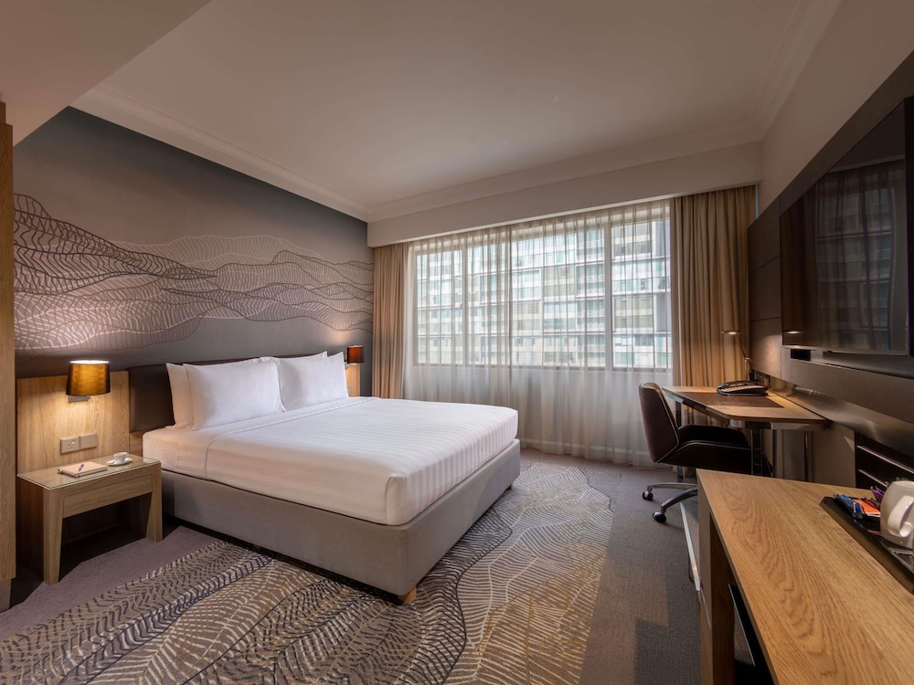 Habitación Deluxe con 1 cama king del hotel Novotel Kuala Lumpur City Centre. Foto 6