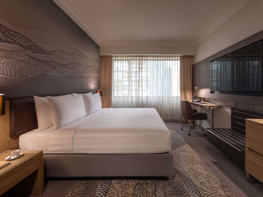 Habitación Deluxe con 1 cama king del hotel Novotel Kuala Lumpur City Centre. Foto 8